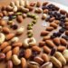 Nutritional Comparison of Peanuts, Almonds, Cashews, Pistachios, and Raisins: Calories, Protein, Fats, Carbs, Fiber, and Micronutrients 6 Nutritional Comparison of Peanuts, Almonds, Cashews, Pistachios, and Raisins: Calories, Protein, Fats, Carbs, Fiber, and Micronutrients